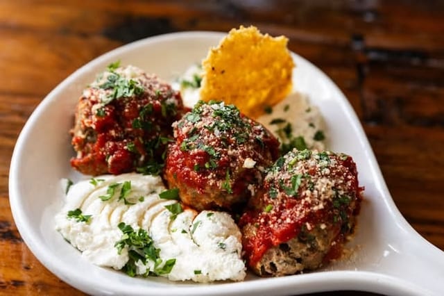 HALF TRAY NONNA'S MEATBALLS.